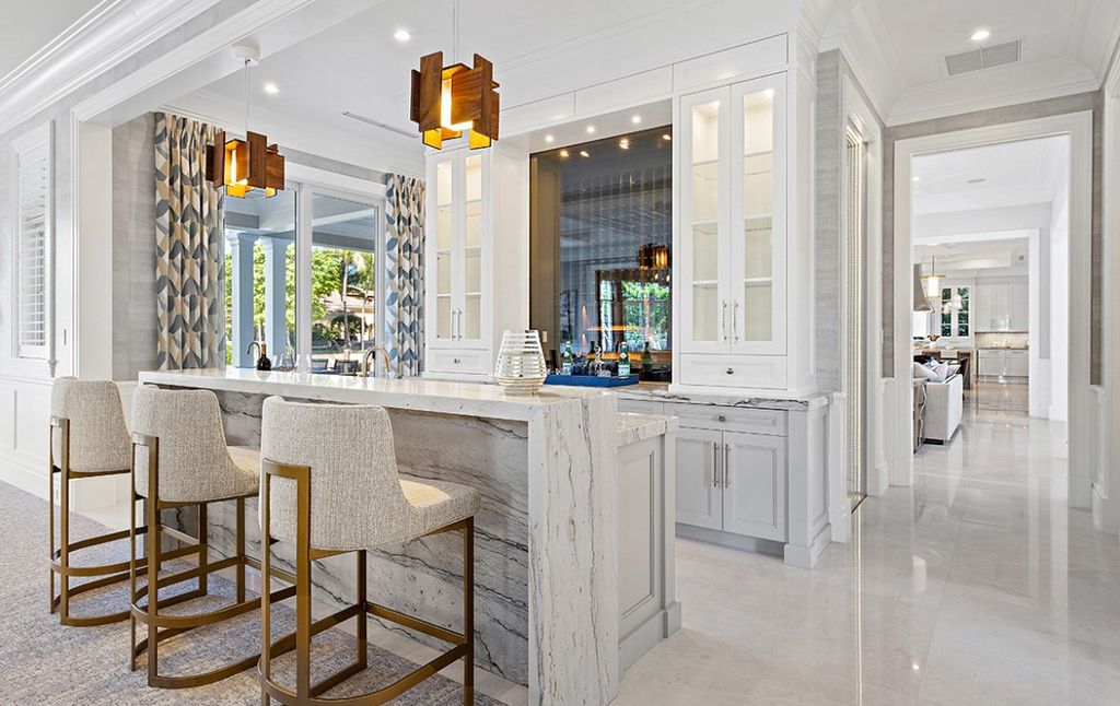 This Magnificent Home in Florida was executed by prestigious Wietsma Lippolis Construction. This home has lavish finishes, attention to detail, and outstanding craftsmanship