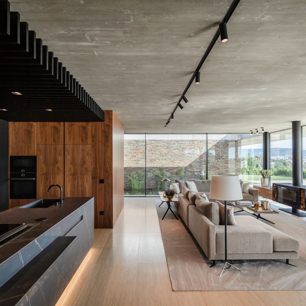 Cork Trees House by Trama Arquitetos a Raw concrete floats over Horizon 14