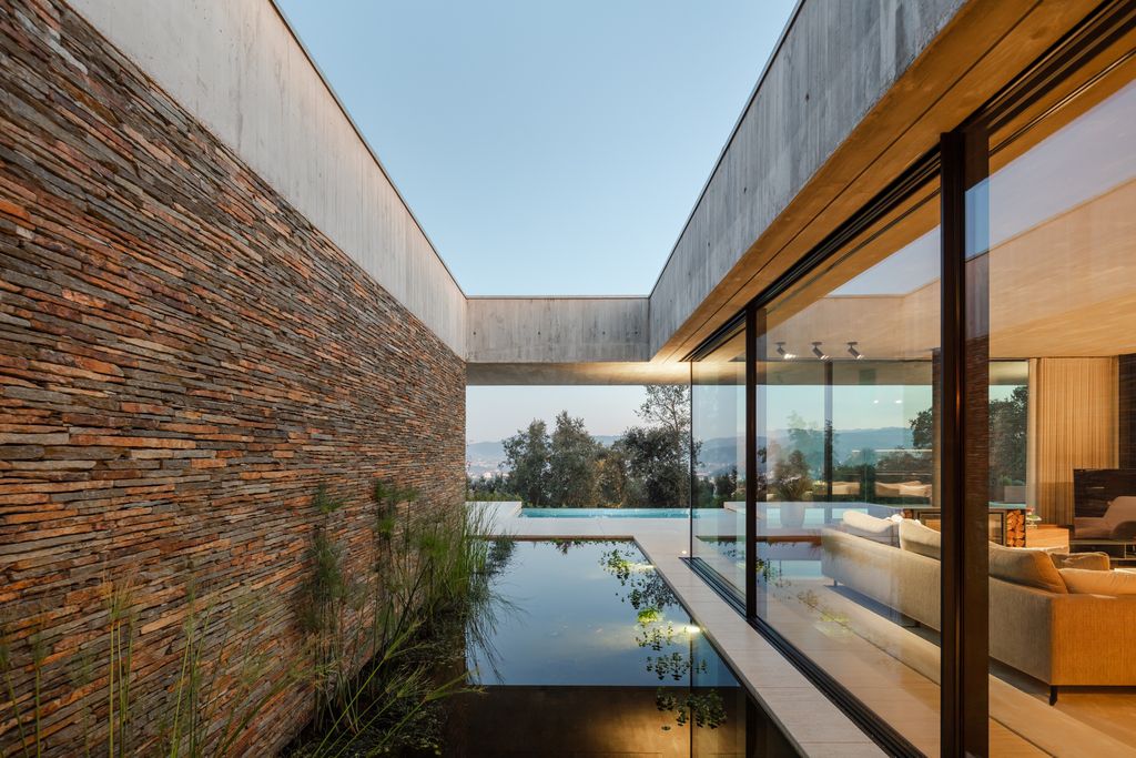 Cork Trees House by Trama Arquitetos a Raw concrete floats over Horizon 15