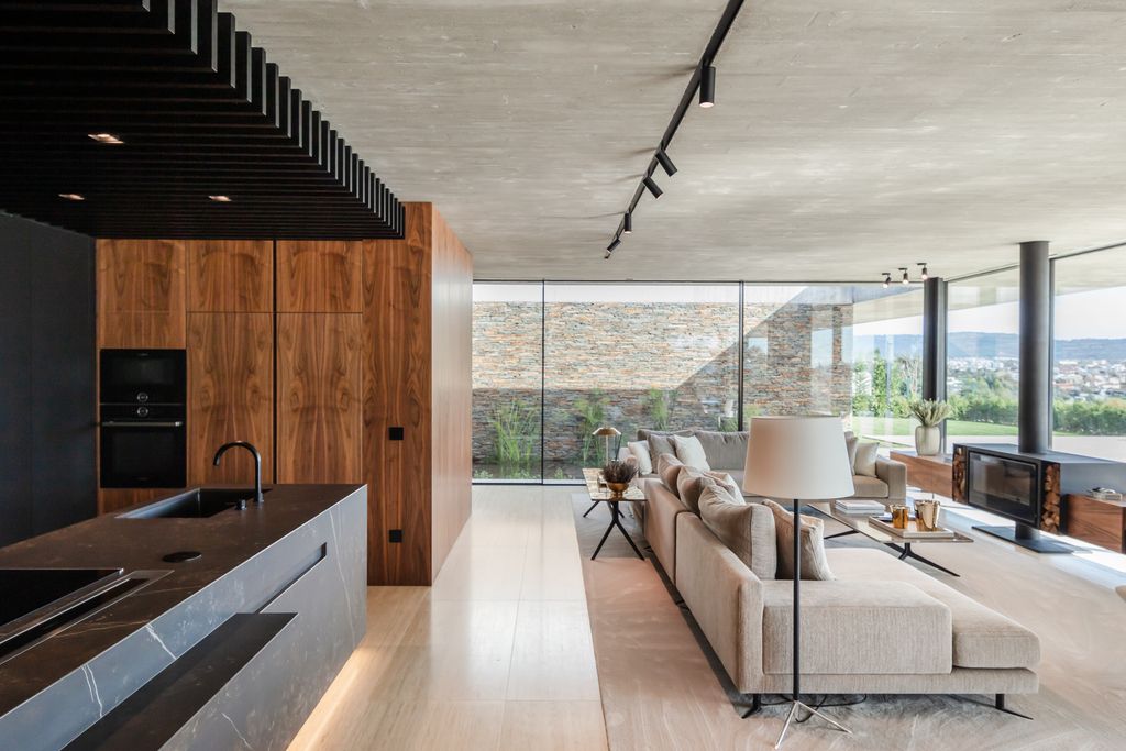 Cork Trees House by Trama Arquitetos a Raw concrete floats over Horizon 18
