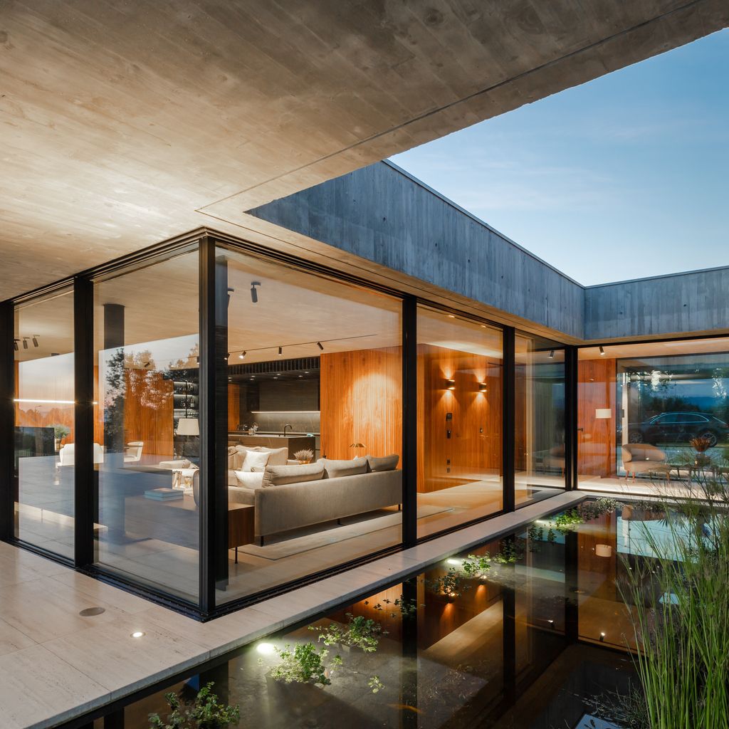 Cork Trees House by Trama Arquitetos a Raw concrete floats over Horizon 27