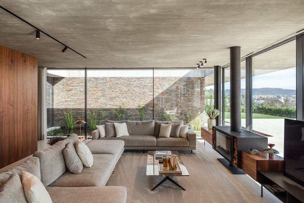 Cork Trees House by Trama Arquitetos a Raw concrete floats over Horizon 5