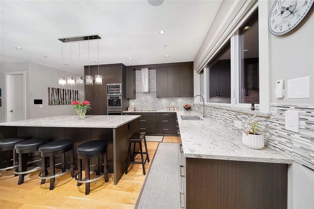 The Fabulous Home in West Vancouver has superb quality & the finest workmanship by Vela Designs now available for sale. This home located at 1010 Wildwood Ln, West Vancouver, BC V7S 2H8, Canada