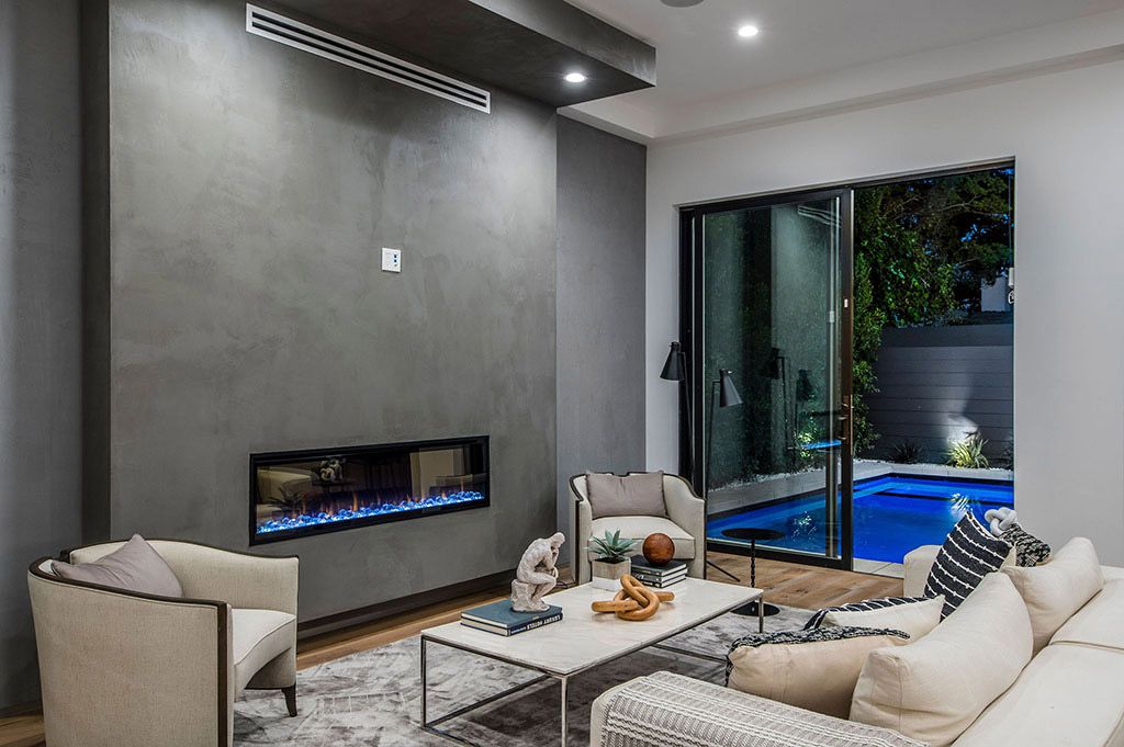 This Flawless Modern Home in Studio City was built and designed by the famous Arzuman Brothers. The house is seamlessly blending exquisite design, and an impeccable choice of quality materials as well as embracing the security and convenience of today’s most up-to-date technology