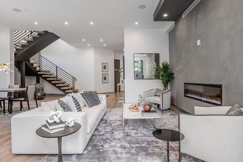 This Flawless Modern Home in Studio City was built and designed by the famous Arzuman Brothers. The house is seamlessly blending exquisite design, and an impeccable choice of quality materials as well as embracing the security and convenience of today’s most up-to-date technology