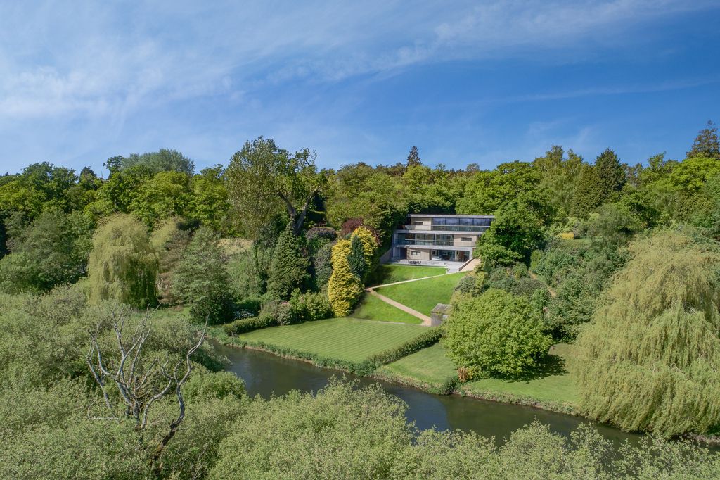 Folding House for Retiree with Stunning River Views by AR Design Studio 11