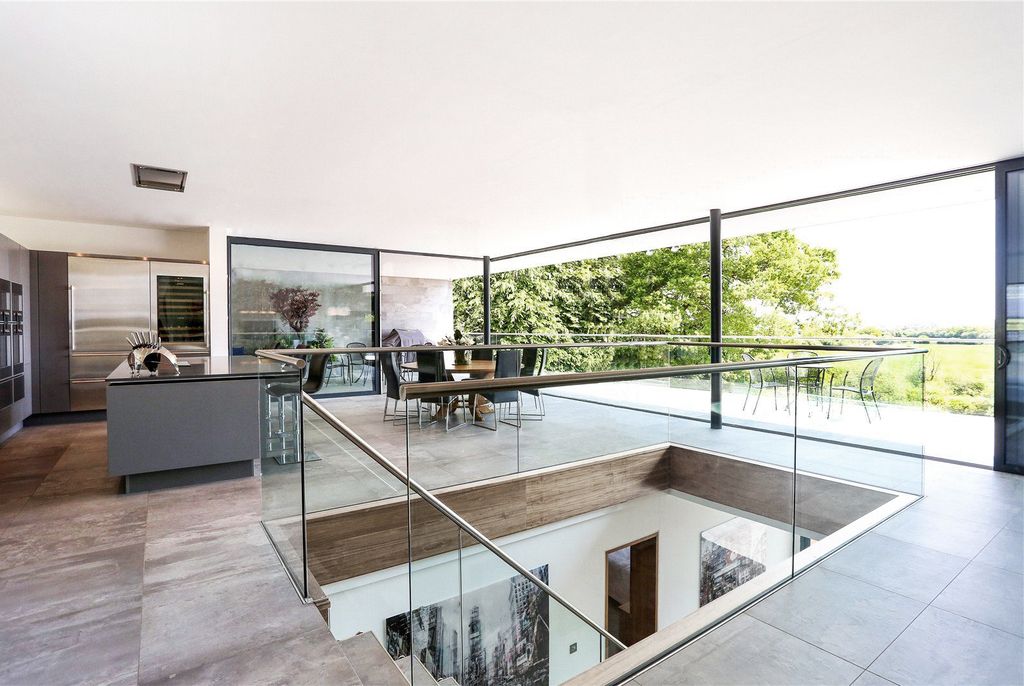 Folding House for Retiree with Stunning River Views by AR Design Studio