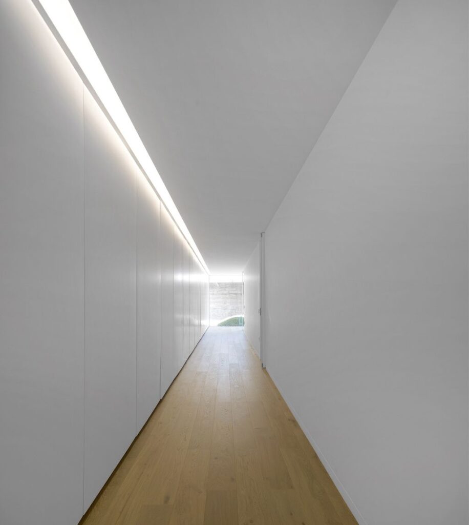 Long textured Sambade House in Portugal Countryside by Spaceworkers