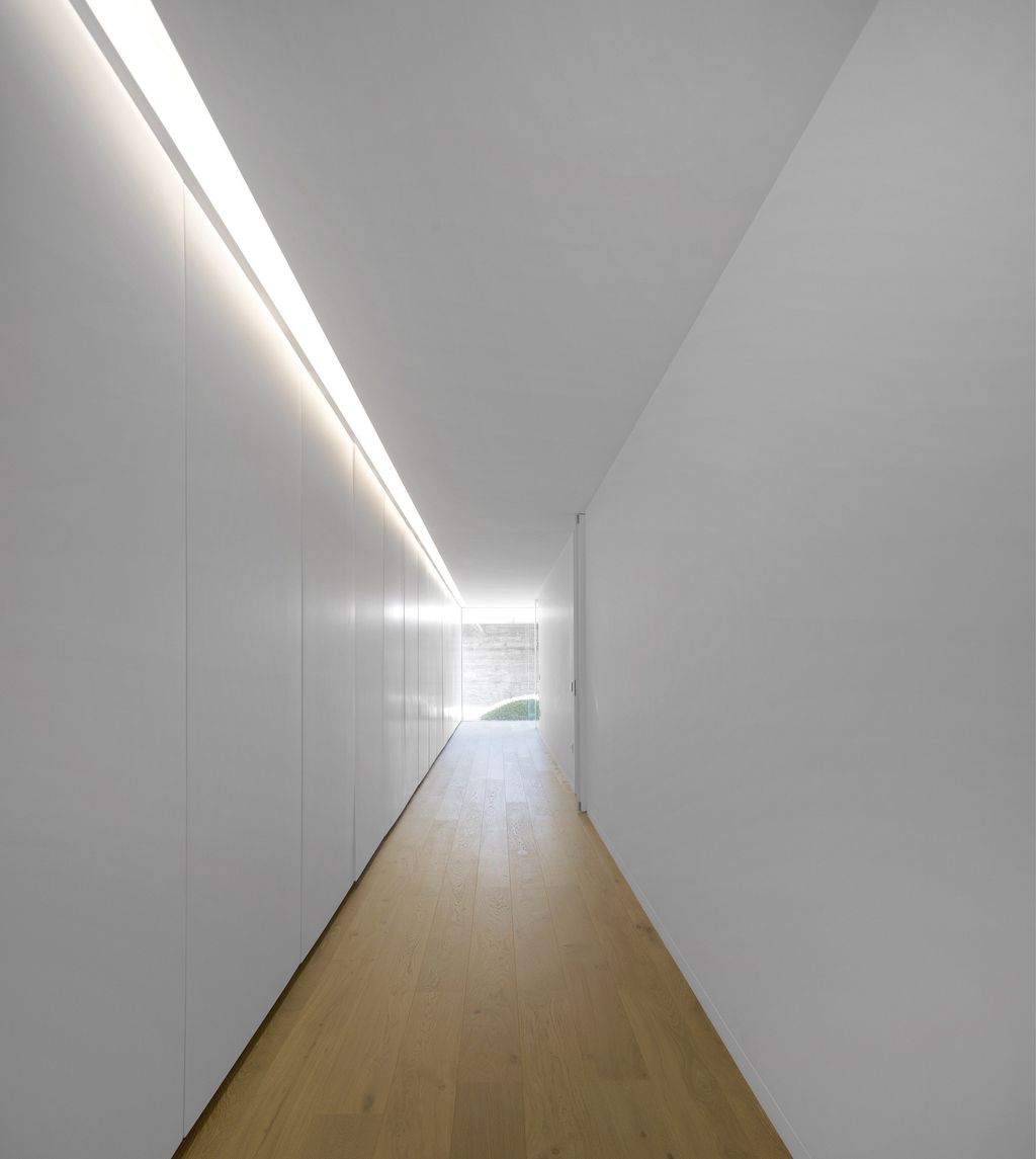 Long textured Sambade House in Portugal Countryside by Spaceworkers