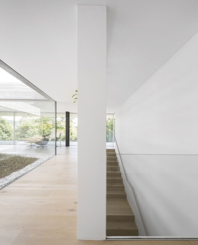 Long textured Sambade House in Portugal Countryside by Spaceworkers