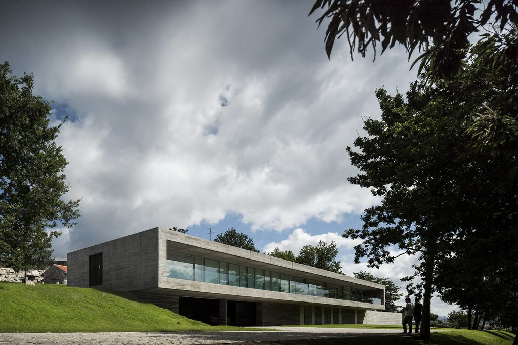 Long textured Sambade House in Portugal Countryside by Spaceworkers