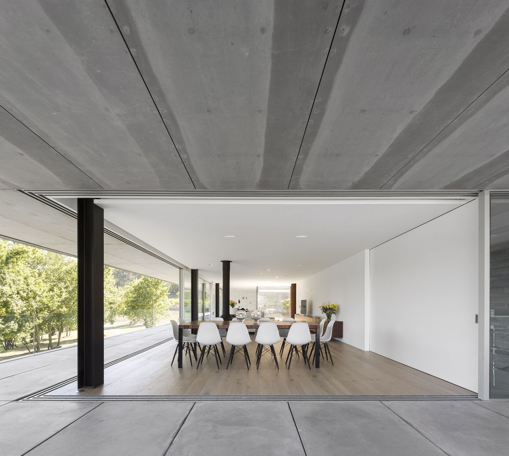Long textured Sambade House in Portugal Countryside by Spaceworkers