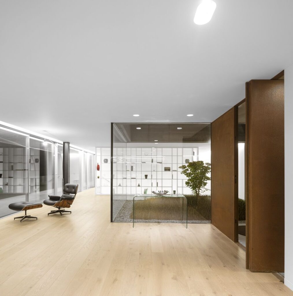 Long textured Sambade House in Portugal Countryside by Spaceworkers