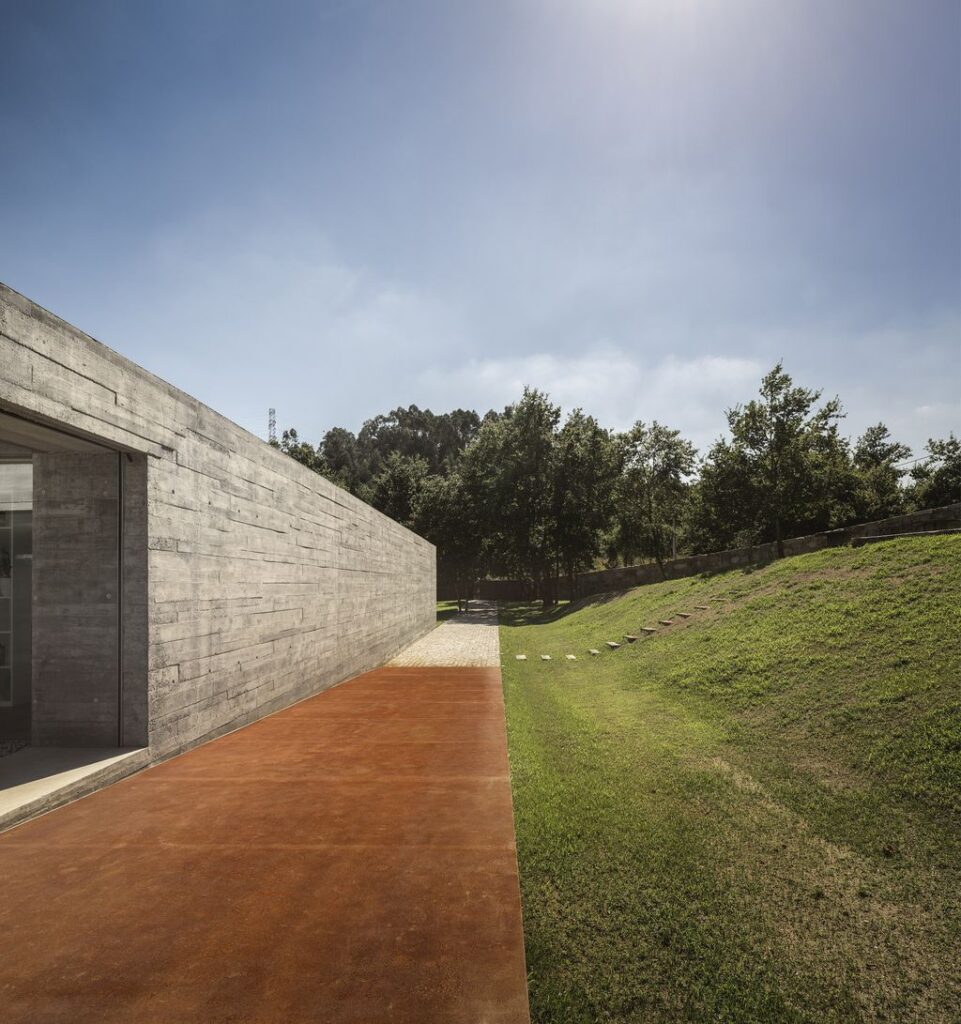 Long textured Sambade House in Portugal Countryside by Spaceworkers