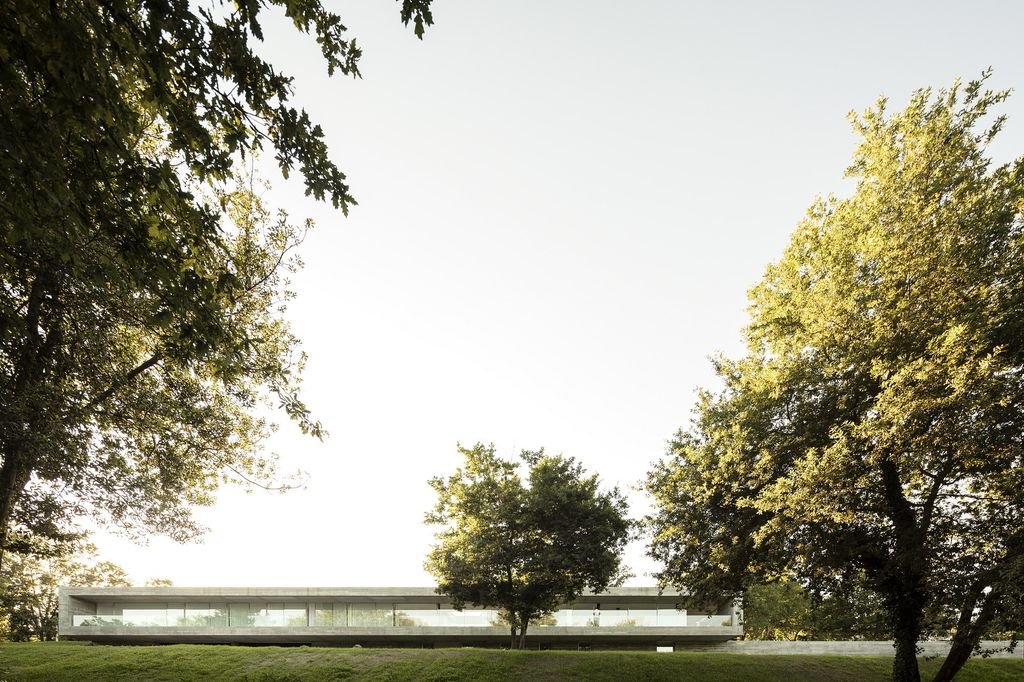 Long textured Sambade House in Portugal Countryside by Spaceworkers