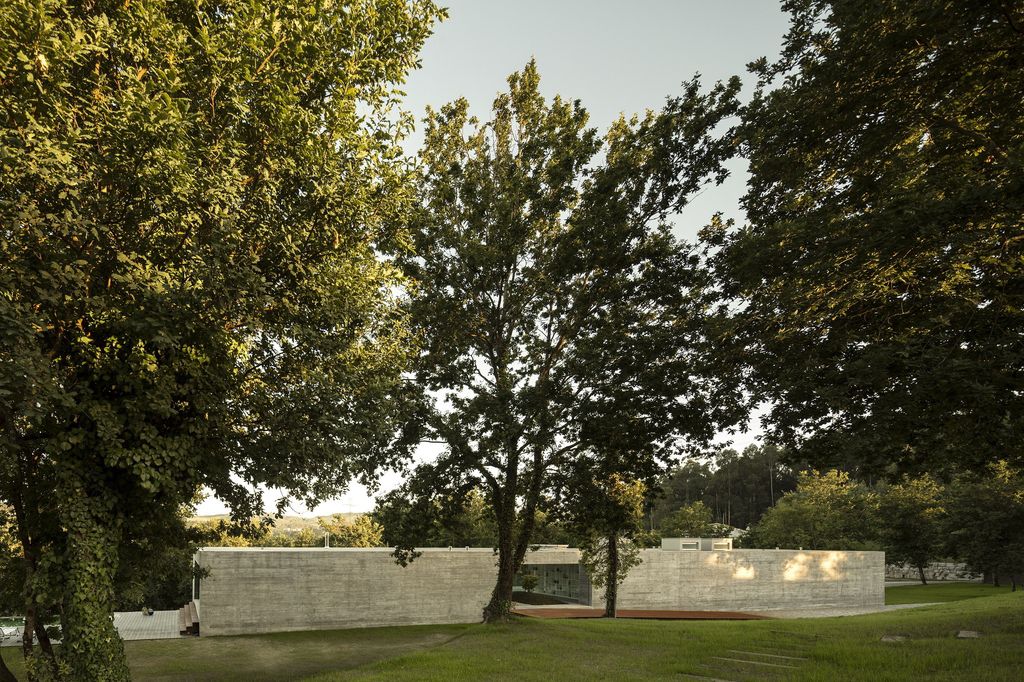 Long textured Sambade House in Portugal Countryside by Spaceworkers