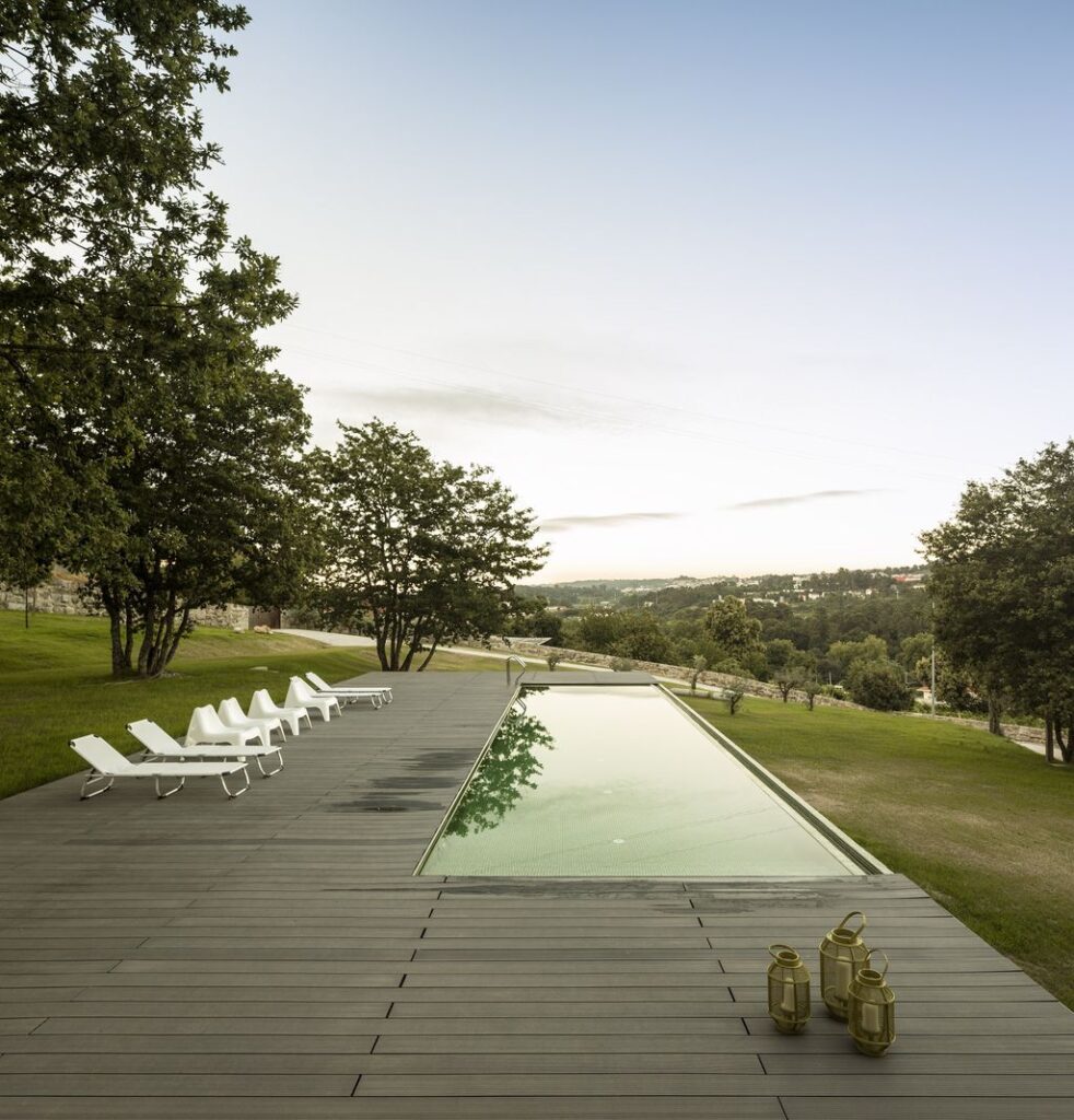Long textured Sambade House in Portugal Countryside by Spaceworkers