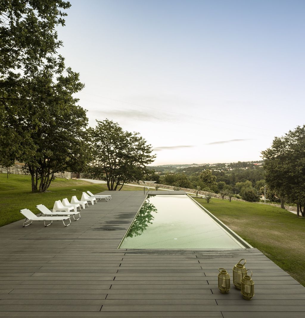 Long textured Sambade House in Portugal Countryside by Spaceworkers