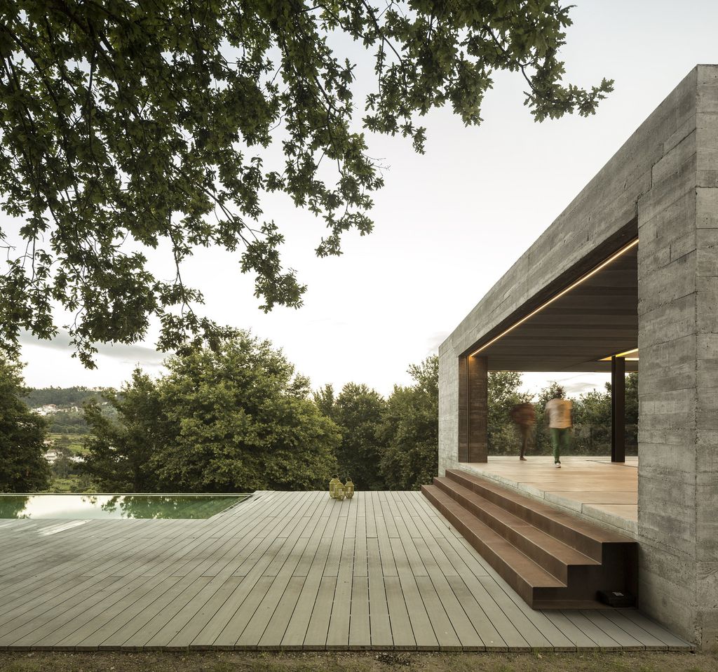 Long textured Sambade House in Portugal Countryside by Spaceworkers