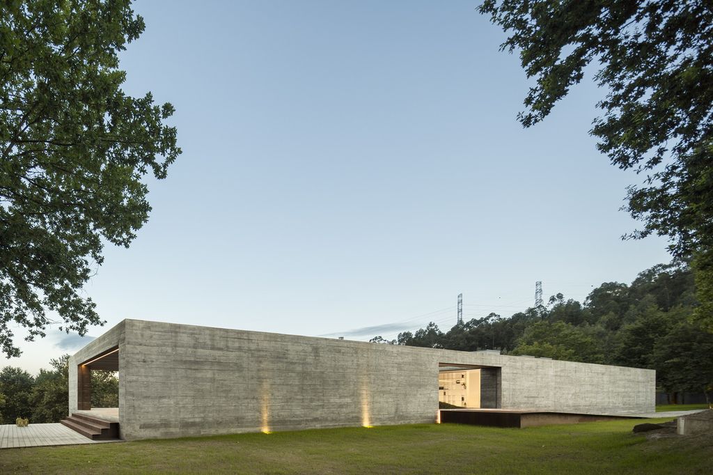 Long textured Sambade House in Portugal Countryside by Spaceworkers
