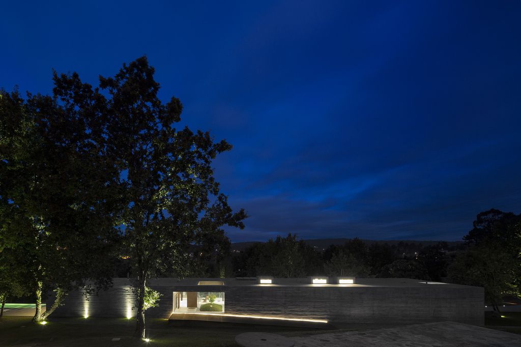 Long textured Sambade House in Portugal Countryside by Spaceworkers