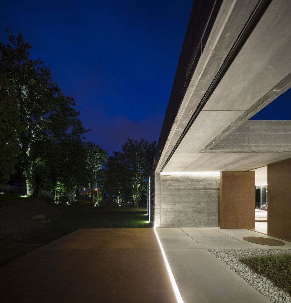 Long textured Sambade House in Portugal Countryside by Spaceworkers