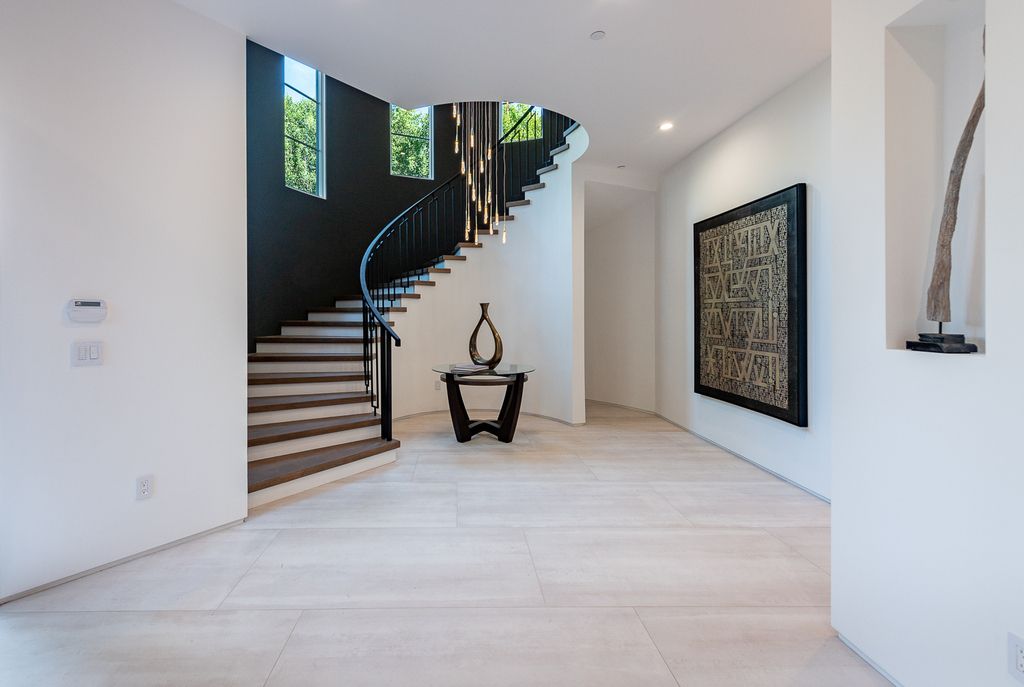 This Marvelous Spanish Contemporary Home in California designed and built by the legendary Arzuman Brothers. This incredible constructed craftsman built-in 2019 consists of 5 bedrooms and 7 bathrooms