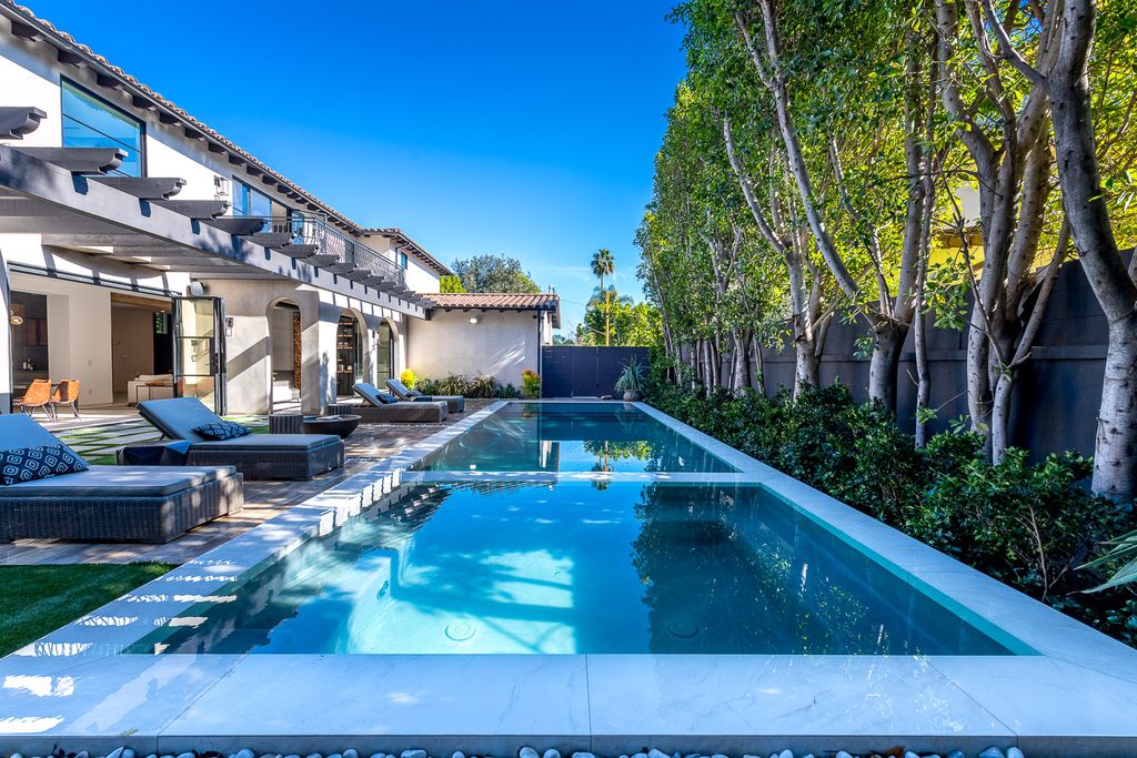 This Marvelous Spanish Contemporary Home in California designed and built by the legendary Arzuman Brothers. This incredible constructed craftsman built-in 2019 consists of 5 bedrooms and 7 bathrooms
