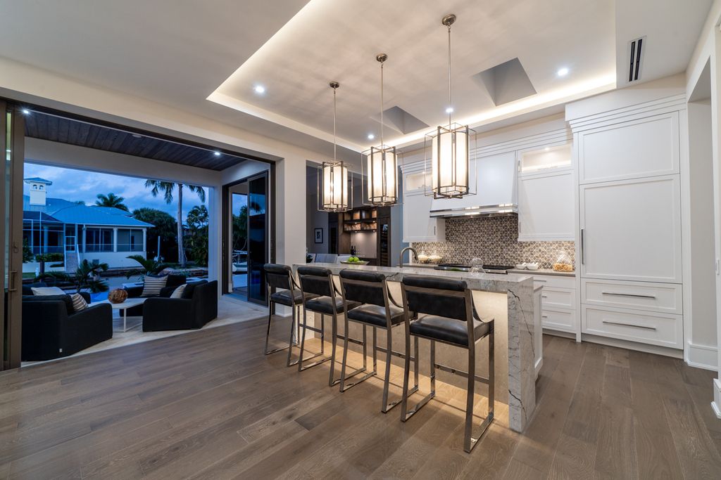 This Mind-Blowing Waterfront Naples Estate was executed by prestigious Gulfstream Homes. This villa redefines understated luxury, in a way that is unparalleled in the marketplace today
