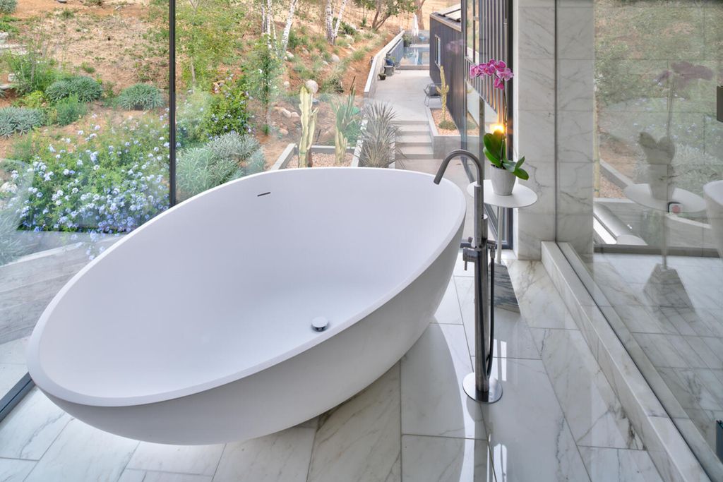 The Modern Home in California is an architectural masterpiece designed and developed by award winning AUX Architecture now available for sale. This home located at 1178 Stunt Rd, Calabasas, California; offering 4 bedrooms and 4 bathrooms with over 4,000 square feet of living spaces.