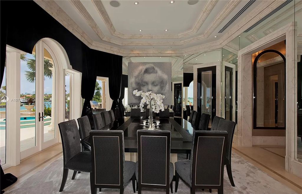 The Florida Mansion is a palatial estate is designed like no other with Absolutely unparalleled in finishes, appointments now available for sale. This home located at 182 Bal Bay Dr, Bal Harbour, Florida; offering 8 bedrooms and 11 bathrooms with over 12,000 square feet of living spaces.