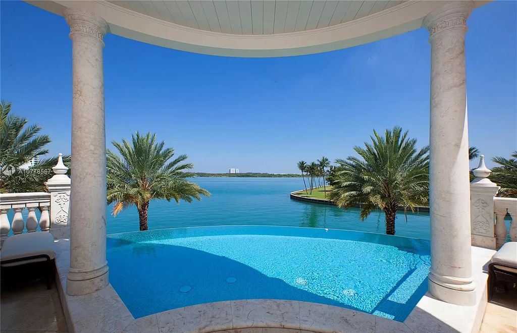 The Florida Mansion is a palatial estate is designed like no other with Absolutely unparalleled in finishes, appointments now available for sale. This home located at 182 Bal Bay Dr, Bal Harbour, Florida; offering 8 bedrooms and 11 bathrooms with over 12,000 square feet of living spaces.