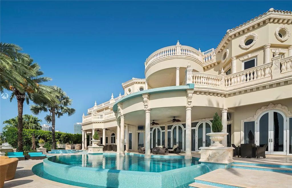The Florida Mansion is a palatial estate is designed like no other with Absolutely unparalleled in finishes, appointments now available for sale. This home located at 182 Bal Bay Dr, Bal Harbour, Florida; offering 8 bedrooms and 11 bathrooms with over 12,000 square feet of living spaces.