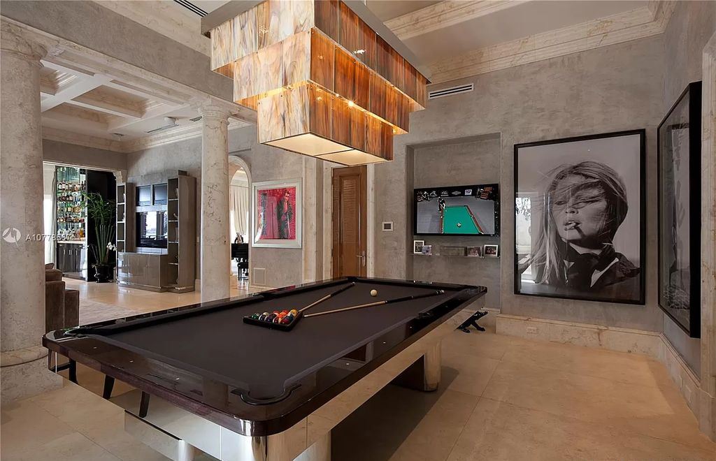 The Florida Mansion is a palatial estate is designed like no other with Absolutely unparalleled in finishes, appointments now available for sale. This home located at 182 Bal Bay Dr, Bal Harbour, Florida; offering 8 bedrooms and 11 bathrooms with over 12,000 square feet of living spaces.