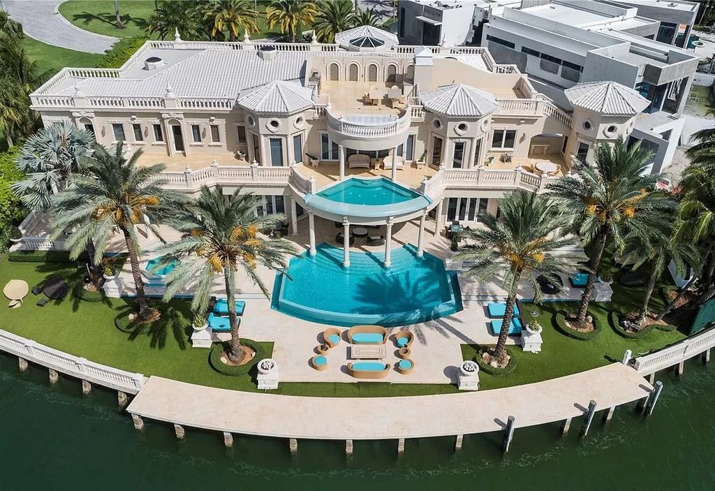 The Florida Mansion is a palatial estate is designed like no other with Absolutely unparalleled in finishes, appointments now available for sale. This home located at 182 Bal Bay Dr, Bal Harbour, Florida; offering 8 bedrooms and 11 bathrooms with over 12,000 square feet of living spaces.