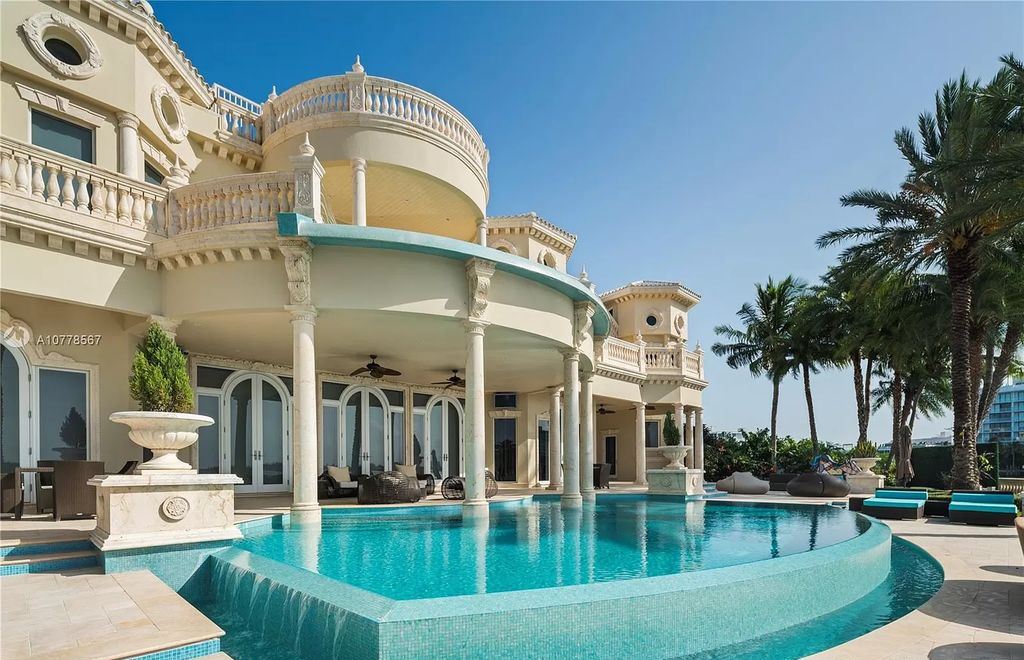 The Florida Mansion is a palatial estate is designed like no other with Absolutely unparalleled in finishes, appointments now available for sale. This home located at 182 Bal Bay Dr, Bal Harbour, Florida; offering 8 bedrooms and 11 bathrooms with over 12,000 square feet of living spaces.