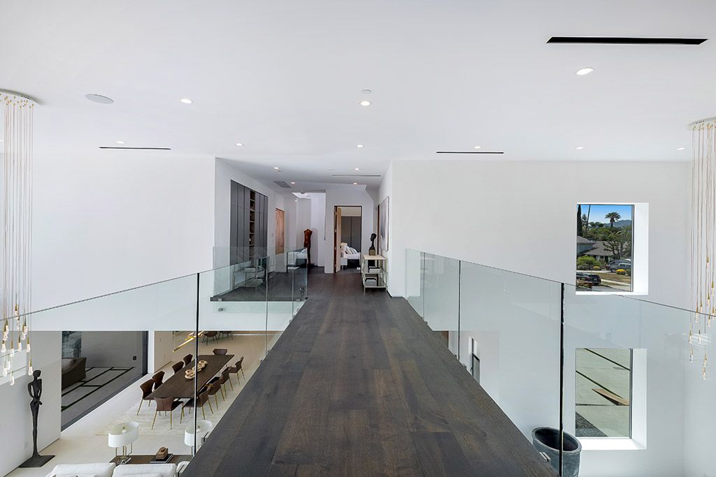 This Studio City Homes, an Architectural Tour De Force was executed and designed by the famed Arzuman Brothers. Situated at the ultimate privacy surrounding green trees and bushed, the over 6,500 sqft luxury home was built in 2018