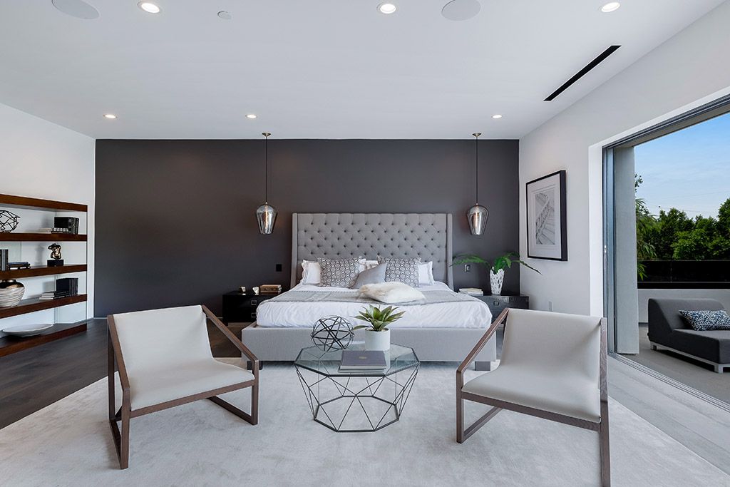 This Studio City Homes, an Architectural Tour De Force was executed and designed by the famed Arzuman Brothers. Situated at the ultimate privacy surrounding green trees and bushed, the over 6,500 sqft luxury home was built in 2018