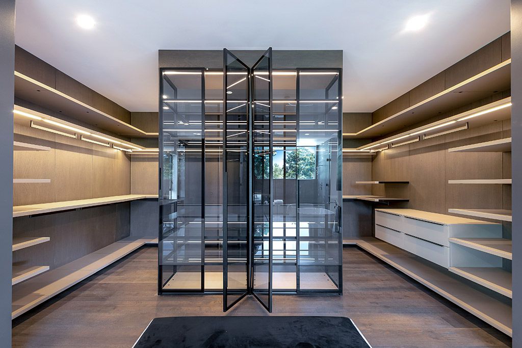 This Studio City Homes, an Architectural Tour De Force was executed and designed by the famed Arzuman Brothers. Situated at the ultimate privacy surrounding green trees and bushed, the over 6,500 sqft luxury home was built in 2018