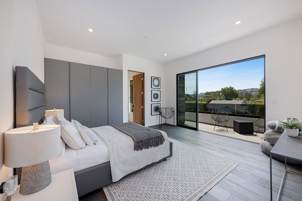 This Studio City Homes, an Architectural Tour De Force was executed and designed by the famed Arzuman Brothers. Situated at the ultimate privacy surrounding green trees and bushed, the over 6,500 sqft luxury home was built in 2018