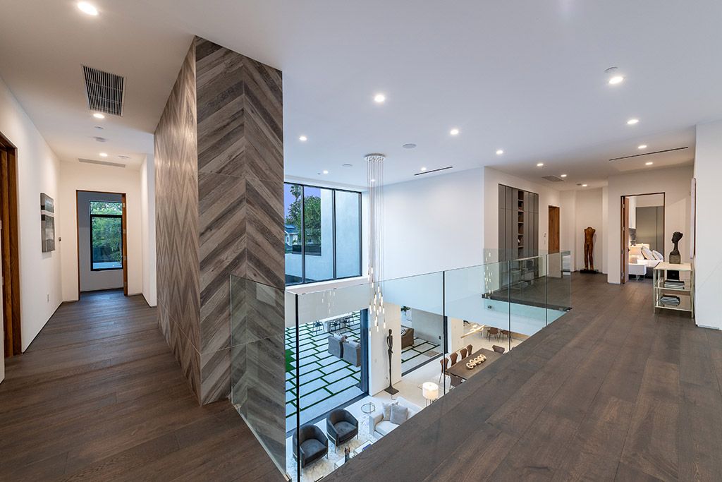 This Studio City Homes, an Architectural Tour De Force was executed and designed by the famed Arzuman Brothers. Situated at the ultimate privacy surrounding green trees and bushed, the over 6,500 sqft luxury home was built in 2018