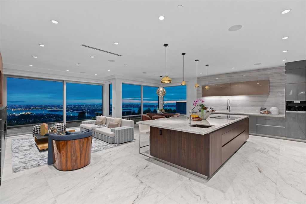 The Sumptuous West Vancouver Villa offers the absolute best panoramic view of Lion Gate Bridge, Downtown & Stanley Park now available for sale. This home located at 1430 Bramwell Rd, West Vancouver, BC V7S 2N9, Canada