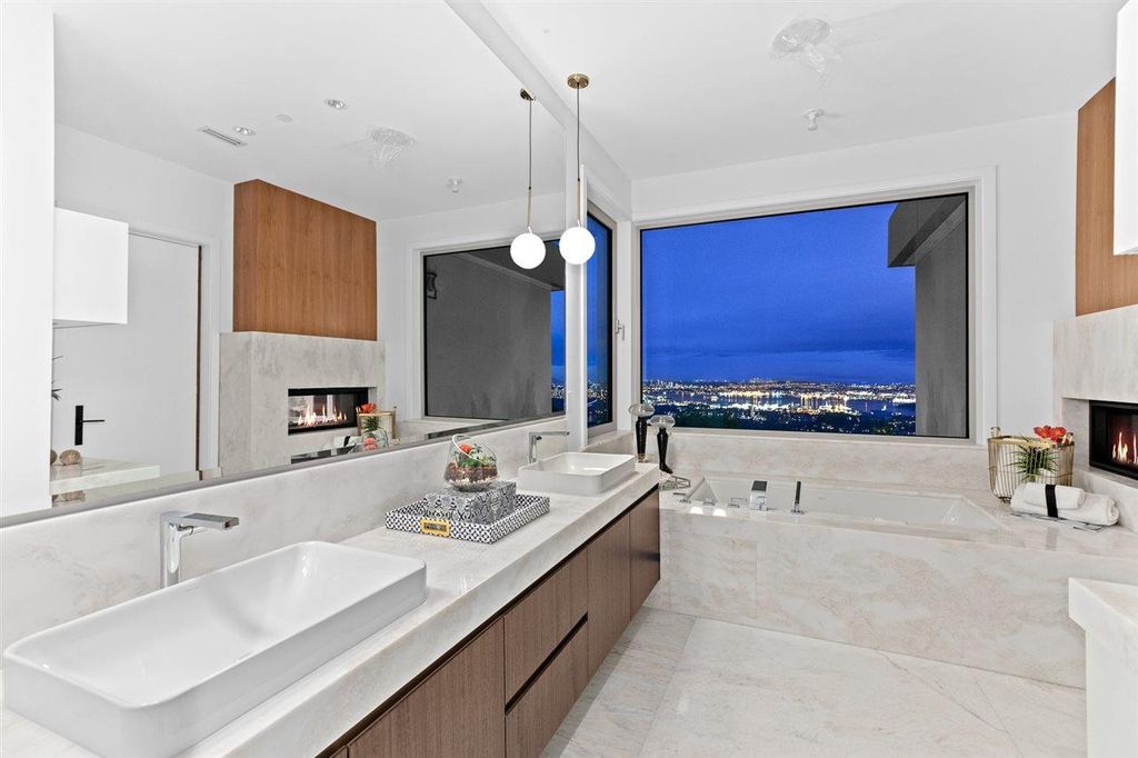 The Sumptuous West Vancouver Villa offers the absolute best panoramic view of Lion Gate Bridge, Downtown & Stanley Park now available for sale. This home located at 1430 Bramwell Rd, West Vancouver, BC V7S 2N9, Canada