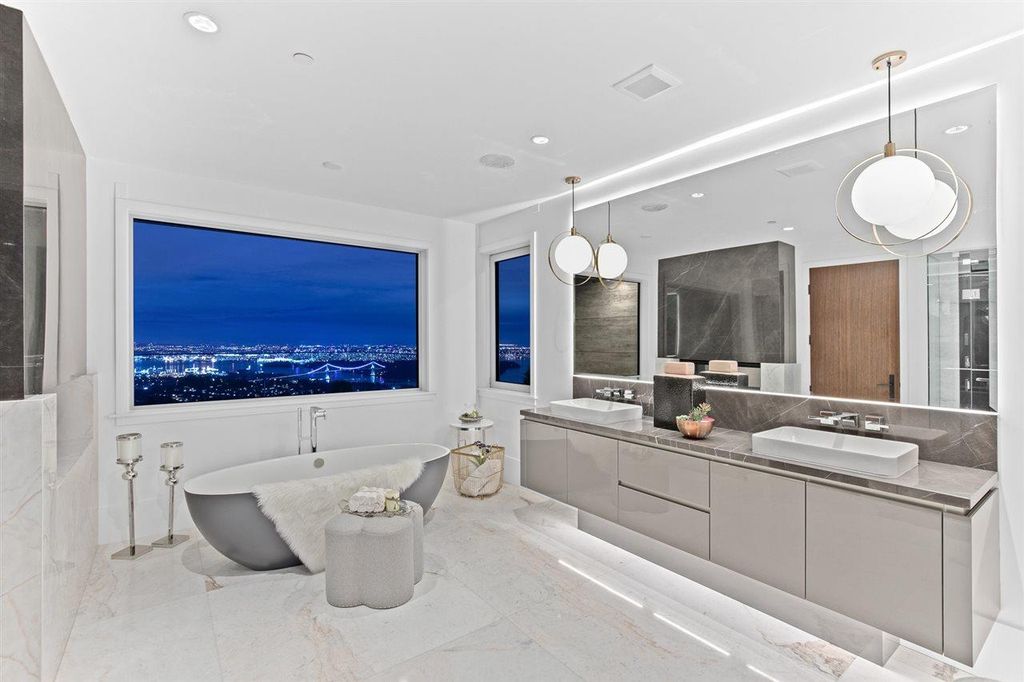 The Sumptuous West Vancouver Villa offers the absolute best panoramic view of Lion Gate Bridge, Downtown & Stanley Park now available for sale. This home located at 1430 Bramwell Rd, West Vancouver, BC V7S 2N9, Canada