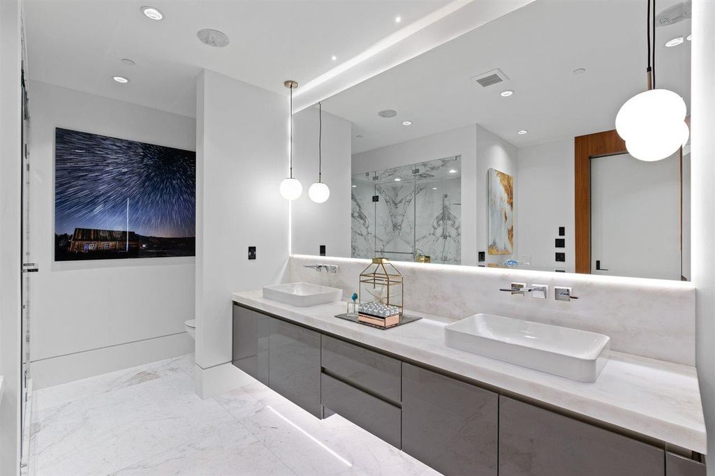 The Sumptuous West Vancouver Villa offers the absolute best panoramic view of Lion Gate Bridge, Downtown & Stanley Park now available for sale. This home located at 1430 Bramwell Rd, West Vancouver, BC V7S 2N9, Canada