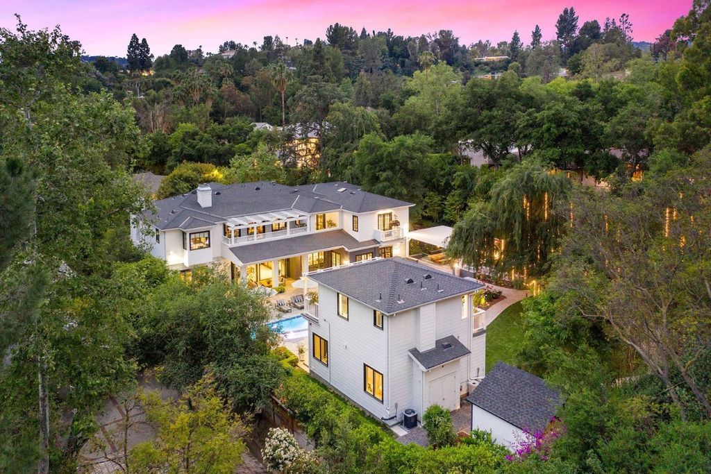 The Encino Home is a sophisticated property in the prestigious Royal Oaks community with a palatial layout provides comfortable space now available for sale. This home located at 16133 High Valley Pl, Encino, California; offering 7 bedrooms and 10 bathrooms with over 8,500 square feet of living spaces.
