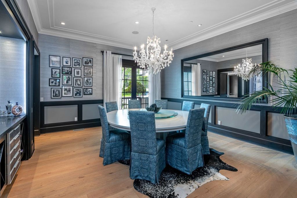 The Encino Home is a sophisticated property in the prestigious Royal Oaks community with a palatial layout provides comfortable space now available for sale. This home located at 16133 High Valley Pl, Encino, California; offering 7 bedrooms and 10 bathrooms with over 8,500 square feet of living spaces.