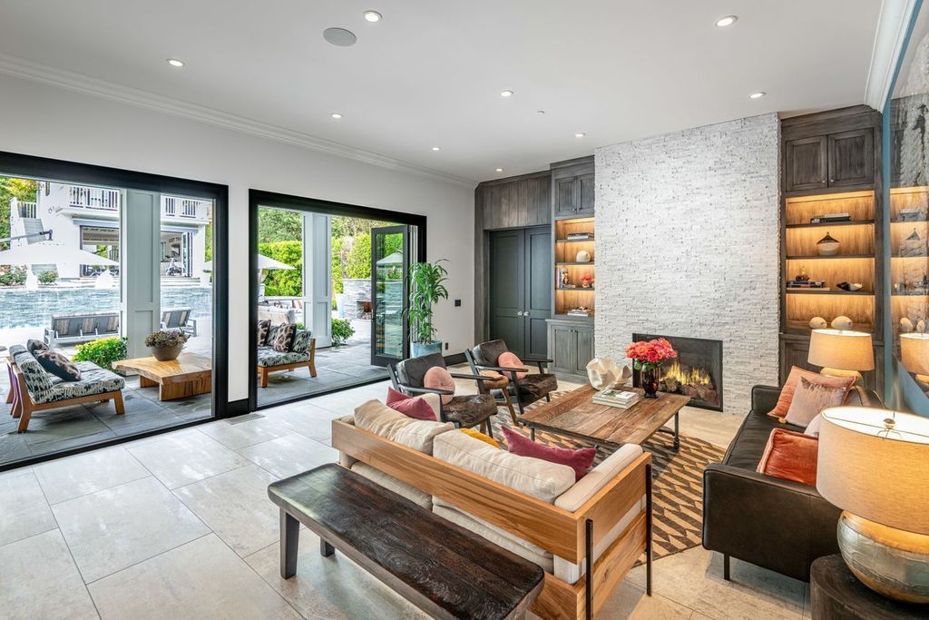 The Encino Home is a sophisticated property in the prestigious Royal Oaks community with a palatial layout provides comfortable space now available for sale. This home located at 16133 High Valley Pl, Encino, California; offering 7 bedrooms and 10 bathrooms with over 8,500 square feet of living spaces.