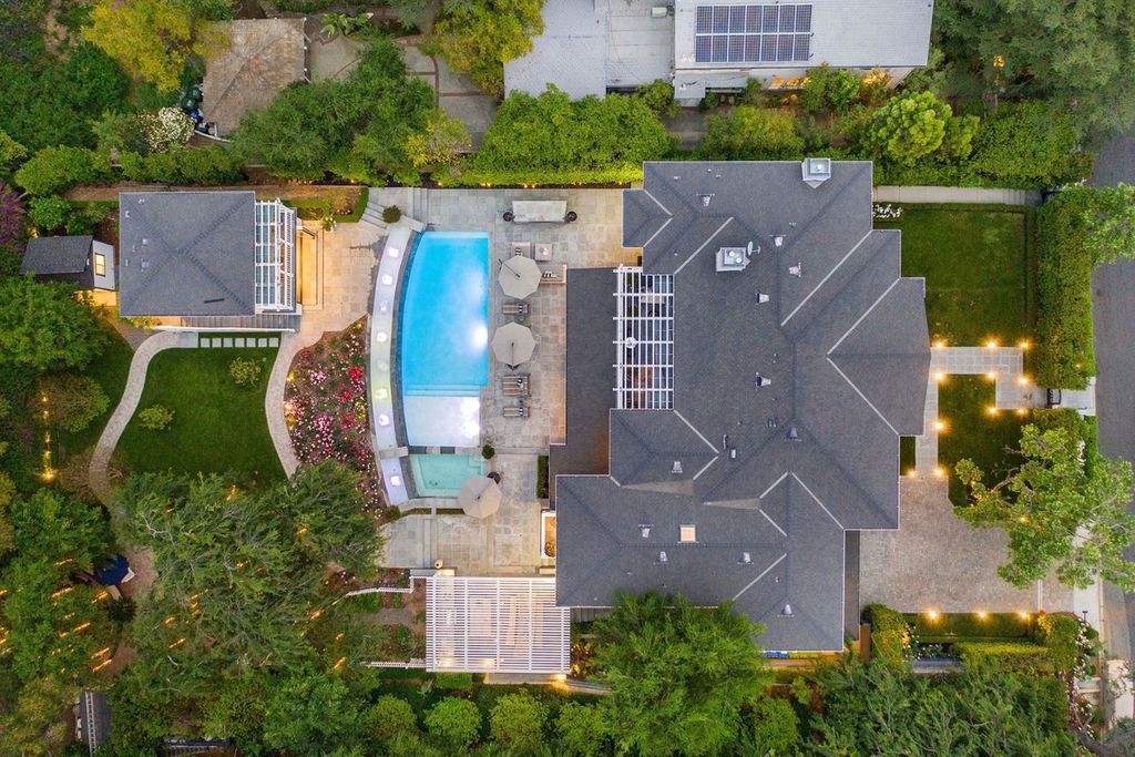 The Encino Home is a sophisticated property in the prestigious Royal Oaks community with a palatial layout provides comfortable space now available for sale. This home located at 16133 High Valley Pl, Encino, California; offering 7 bedrooms and 10 bathrooms with over 8,500 square feet of living spaces.