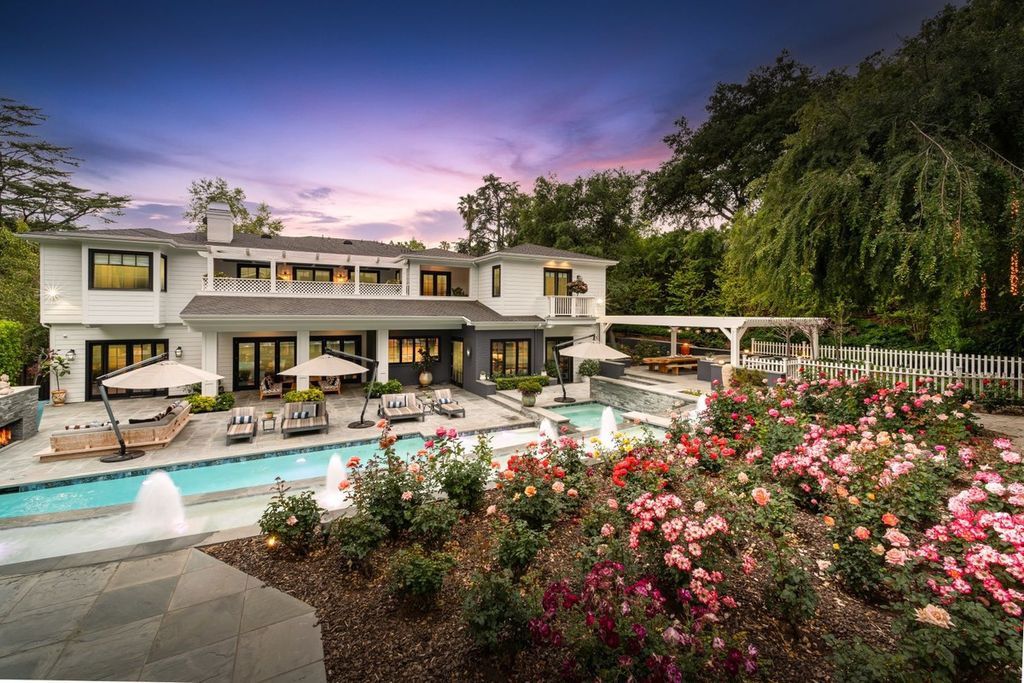 The Encino Home is a sophisticated property in the prestigious Royal Oaks community with a palatial layout provides comfortable space now available for sale. This home located at 16133 High Valley Pl, Encino, California; offering 7 bedrooms and 10 bathrooms with over 8,500 square feet of living spaces.